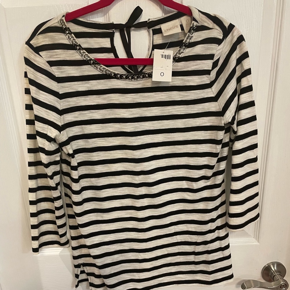 Chico’s brand includes shipping.